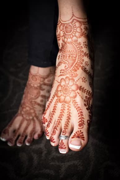Traditional henna patterns on feet